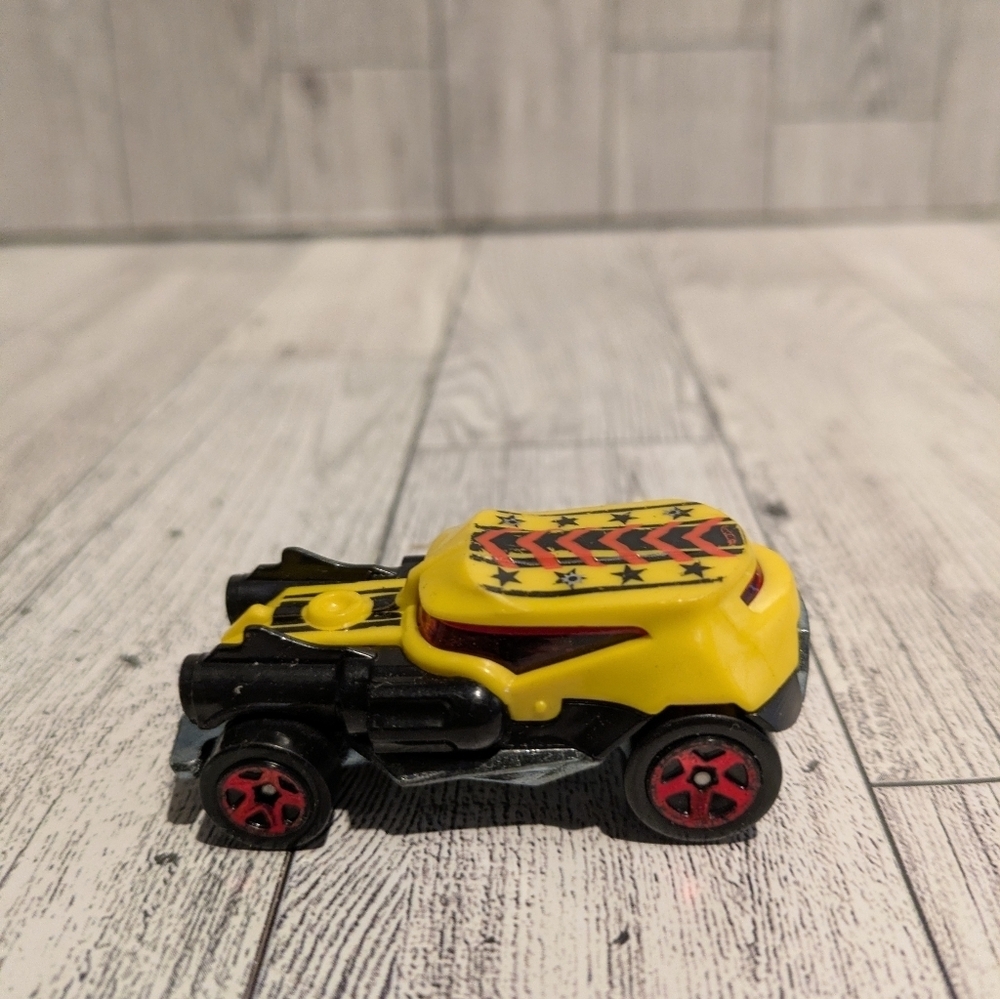 Hot Wheels Yellow and Black Toy Car with Red Wheels